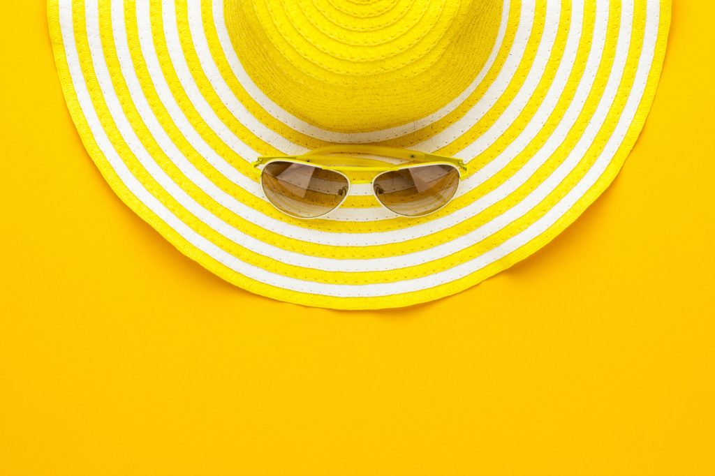 Sunglasses And Striped Retro Hat