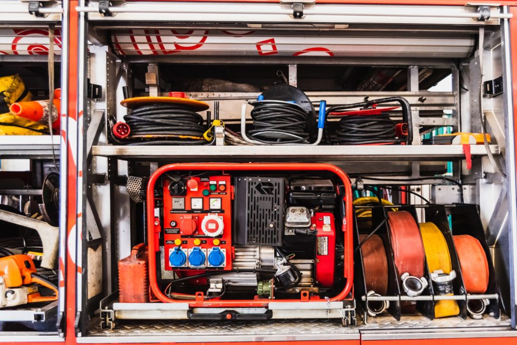 Emergency material of a fire truck, with generator set and hoses.